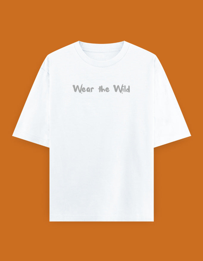 Shop a playful unisex oversized bird photographer t-shirt inspired by birding trips in the Western Ghats. Perfect for birders, wildlife photographers, and nature lovers.