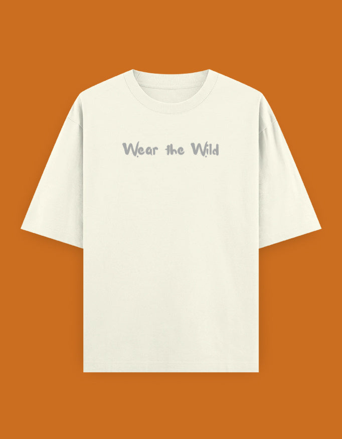 Shop a playful unisex oversized bird photographer t-shirt inspired by birding trips in the Western Ghats. Perfect for birders, wildlife photographers, and nature lovers.

