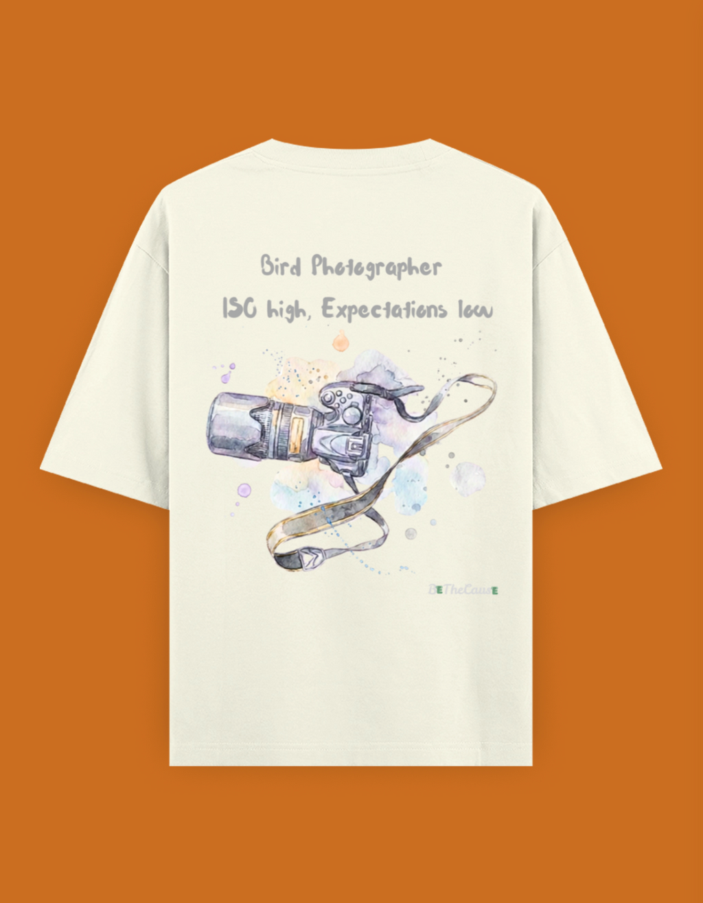 Shop a playful unisex oversized bird photographer t-shirt inspired by birding trips in the Western Ghats. Perfect for birders, wildlife photographers, and nature lovers.