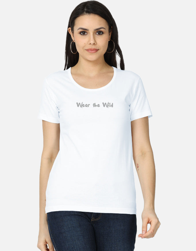 Woman wearing a white t-shirt with a colorful design on a white background