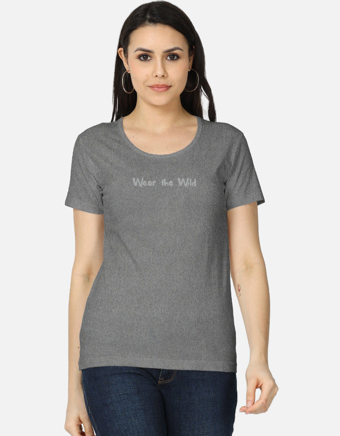 Woman wearing a gray t-shirt with 'imperfect' text on a white background